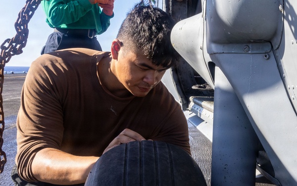 USS Iwo Jima Sailors Conduct Aircraft Maintenance