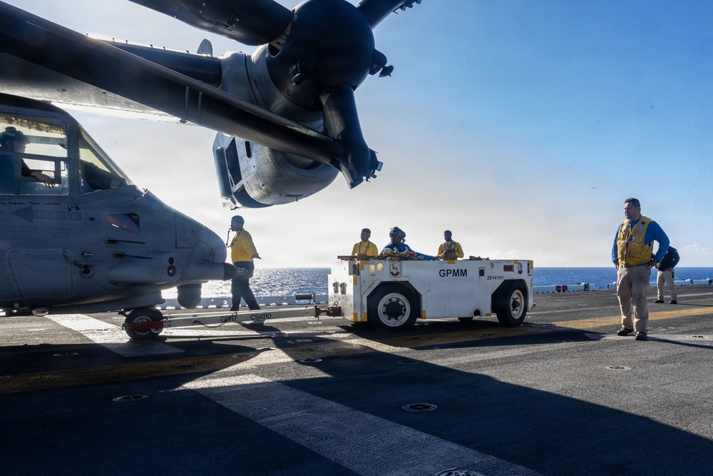 USS Iwo Jima Sailors Guide Aircraft
