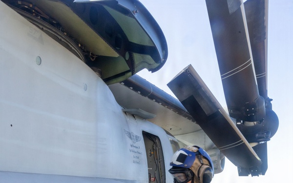 USS Iwo Jima Sailors Guide Aircraft