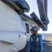 USS Iwo Jima Sailors Guide Aircraft