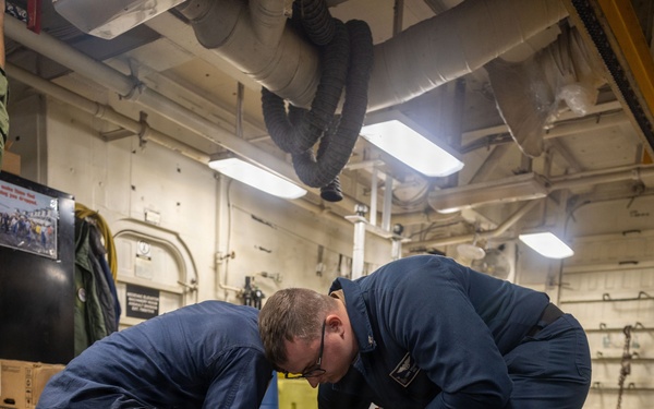 USS Iwo Jima Sailors Perform Maintenance