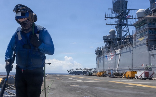 USS Iwo Jima Sailors Clean the Flight Deck