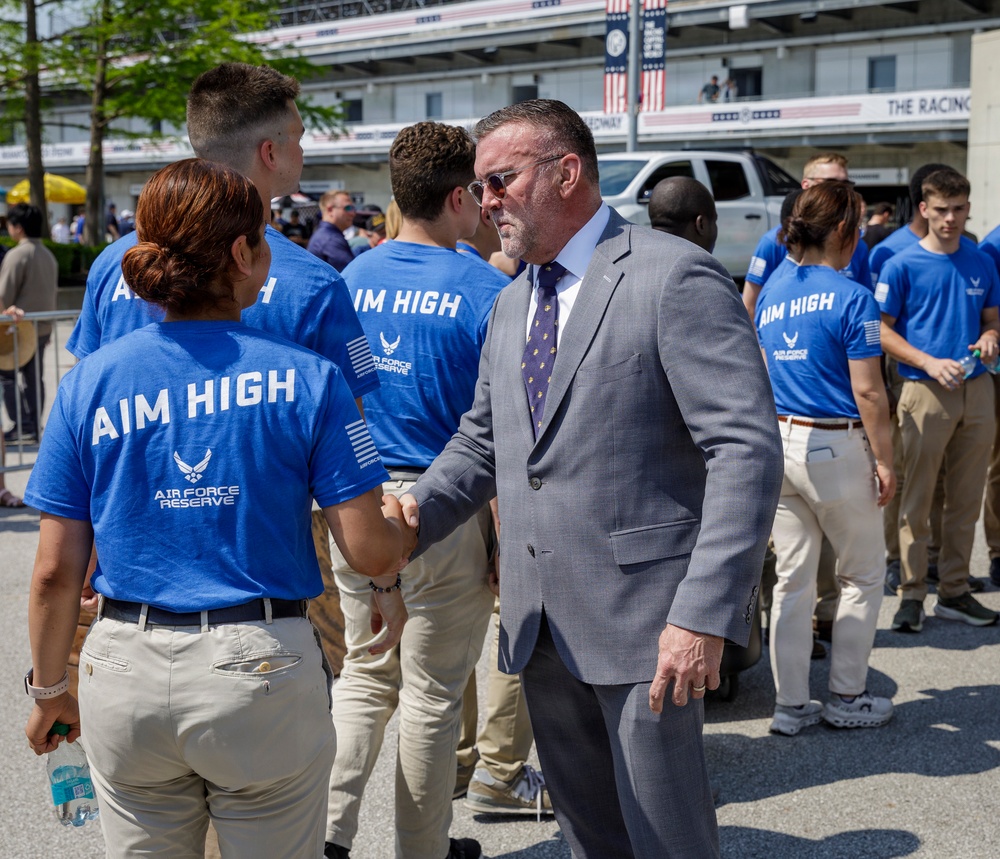 Michael Dodd Shakes Hands with New U.S. Airman