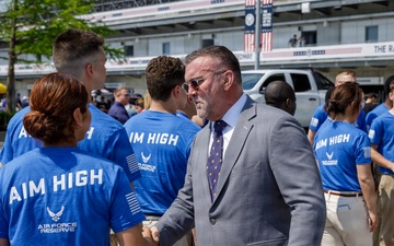 Michael Dodd Shakes Hands with New U.S. Airman