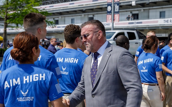 Michael Dodd Shakes Hands with New U.S. Airman