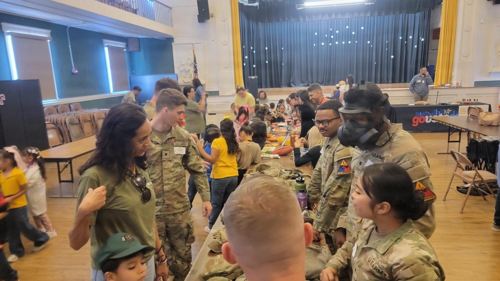 Students and Teachers gather to learn about U.S. Army gear