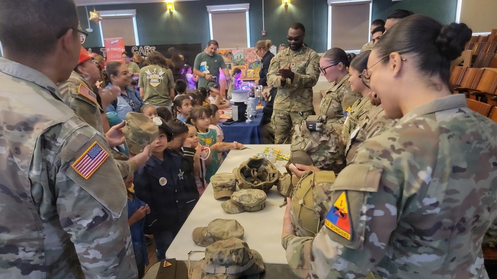 Students and Teachers gather to learn about U.S. Army gear