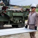 NMCB 1 Sailors and U.S. Marines conduct roof restoration operations in Tinian