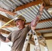 NMCB 1 Sailors and U.S. Marines conduct roof restoration operations in Tinian