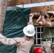 NMCB 1 Sailors and U.S. Marines conduct roof restoration operations in Tinian