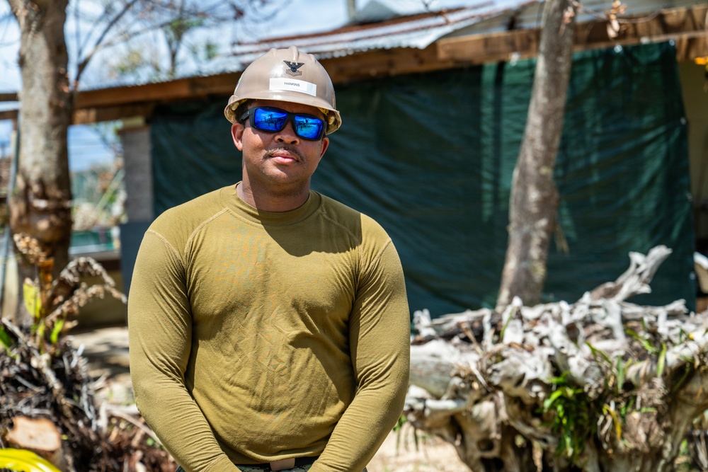 NMCB 1 Sailors and U.S. Marines conduct roof restoration operations in Tinian
