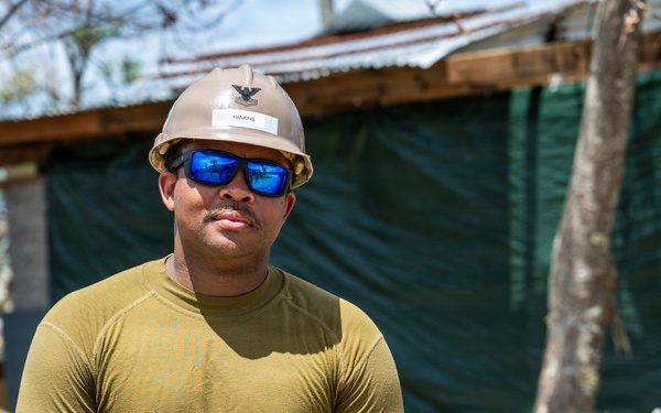 NMCB 1 Sailors and U.S. Marines conduct roof restoration operations in Tinian