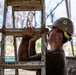 NMCB 1 Sailors and U.S. Marines conduct roof restoration operations in Tinian