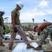NMCB 1 Sailors and U.S. Marines conduct roof restoration operations in Tinian