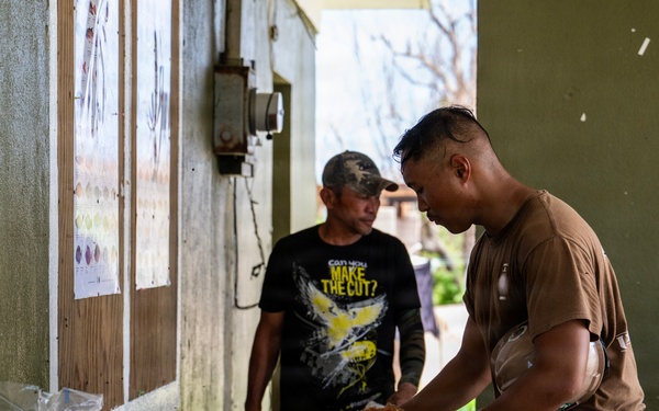 NMCB 1 Sailors and U.S. Marines conduct roof restoration operations in Tinian