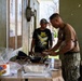 NMCB 1 Sailors and U.S. Marines conduct roof restoration operations in Tinian