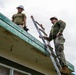 NMCB 1 Sailors and U.S. Marines conduct roof restoration operations in Tinian