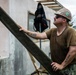 NMCB 1 Sailors and U.S. Marines conduct roof restoration operations in Tinian