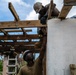 NMCB 1 Sailors and U.S. Marines conduct roof restoration operations in Tinian