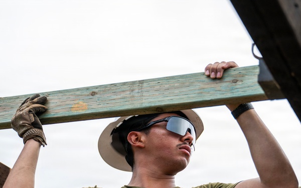 NMCB 1 Sailors and U.S. Marines conduct roof restoration operations in Tinian