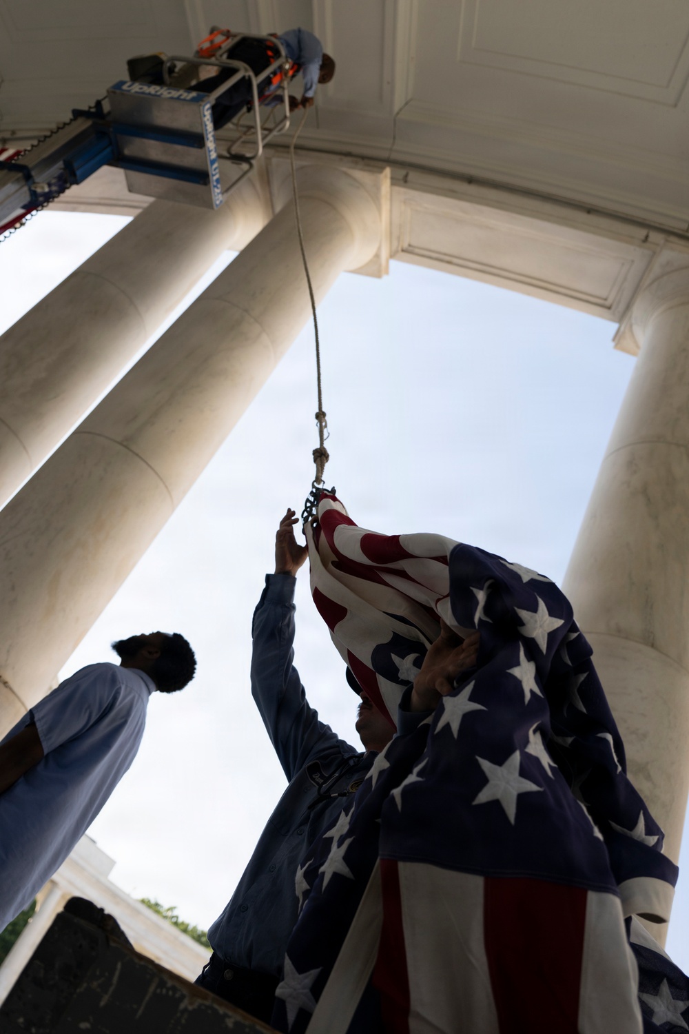 U.S. Flags are Hung in the Memorial Amphitheater in Preparation for the 2026 National Memorial Day Observance