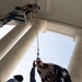 U.S. Flags are Hung in the Memorial Amphitheater in Preparation for the 2026 National Memorial Day Observance