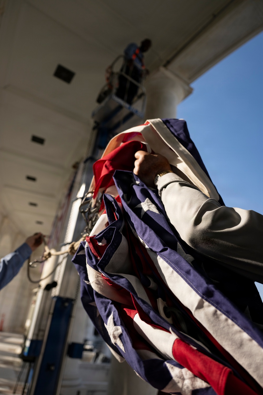 U.S. Flags are Hung in the Memorial Amphitheater in Preparation for the 2026 National Memorial Day Observance