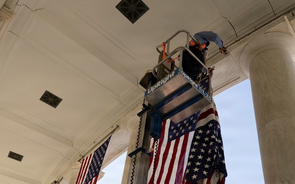 U.S. Flags are Hung in the Memorial Amphitheater in Preparation for the 2026 National Memorial Day Observance