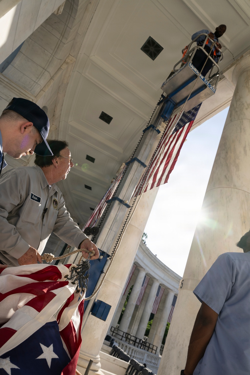 U.S. Flags are Hung in the Memorial Amphitheater in Preparation for the 2026 National Memorial Day Observance