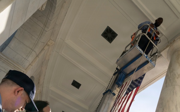 U.S. Flags are Hung in the Memorial Amphitheater in Preparation for the 2026 National Memorial Day Observance