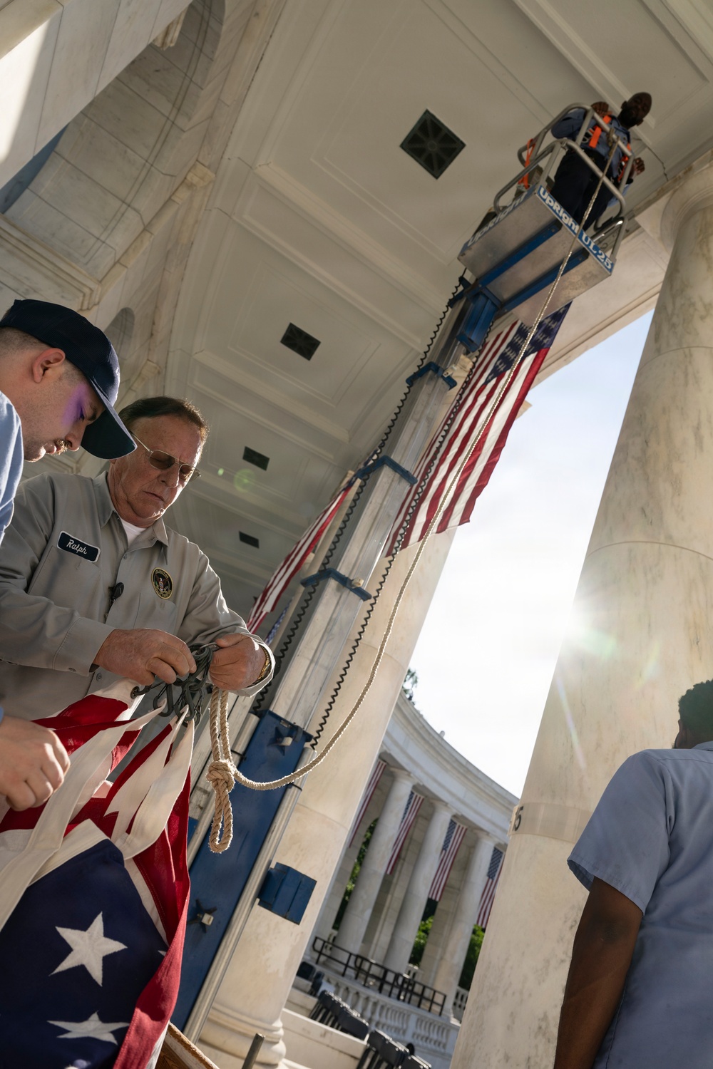 U.S. Flags are Hung in the Memorial Amphitheater in Preparation for the 2026 National Memorial Day Observance