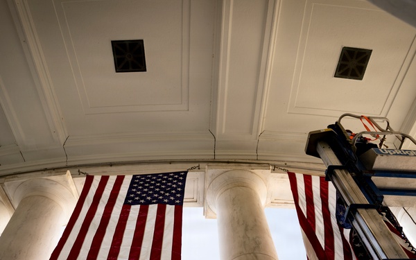 U.S. Flags are Hung in the Memorial Amphitheater in Preparation for the 2026 National Memorial Day Observance