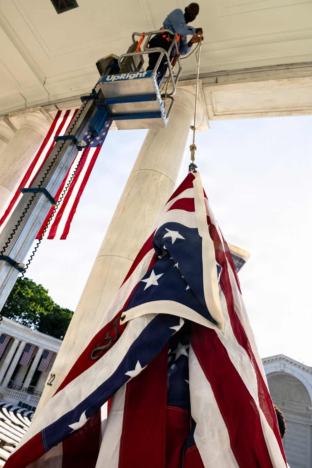 U.S. Flags are Hung in the Memorial Amphitheater in Preparation for the 2026 National Memorial Day Observance