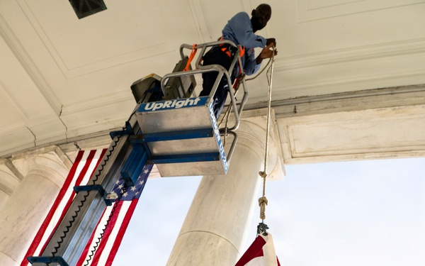 U.S. Flags are Hung in the Memorial Amphitheater in Preparation for the 2026 National Memorial Day Observance
