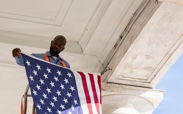 U.S. Flags are Hung in the Memorial Amphitheater in Preparation for the 2026 National Memorial Day Observance