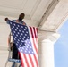 U.S. Flags are Hung in the Memorial Amphitheater in Preparation for the 2026 National Memorial Day Observance