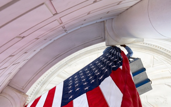U.S. Flags are Hung in the Memorial Amphitheater in Preparation for the 2026 National Memorial Day Observance
