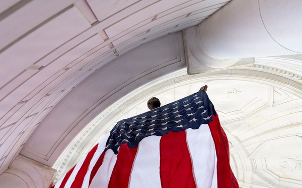 U.S. Flags are Hung in the Memorial Amphitheater in Preparation for the 2026 National Memorial Day Observance