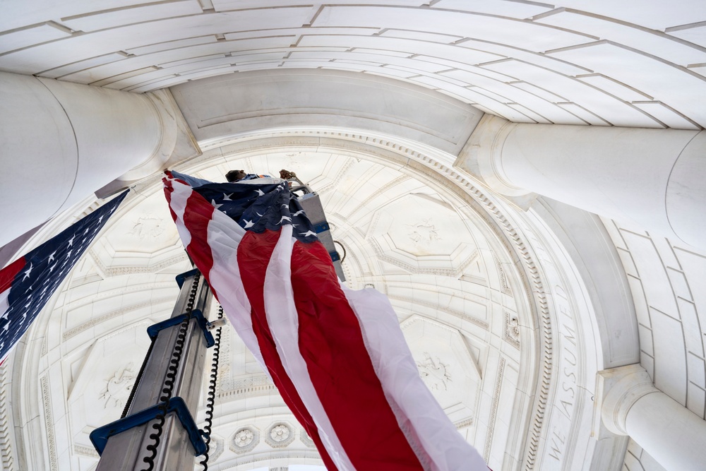 U.S. Flags are Hung in the Memorial Amphitheater in Preparation for the 2026 National Memorial Day Observance