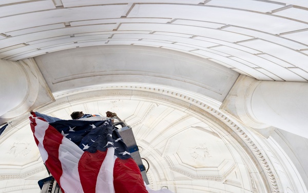U.S. Flags are Hung in the Memorial Amphitheater in Preparation for the 2026 National Memorial Day Observance