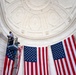 U.S. Flags are Hung in the Memorial Amphitheater in Preparation for the 2026 National Memorial Day Observance