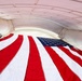 U.S. Flags are Hung in the Memorial Amphitheater in Preparation for the 2026 National Memorial Day Observance