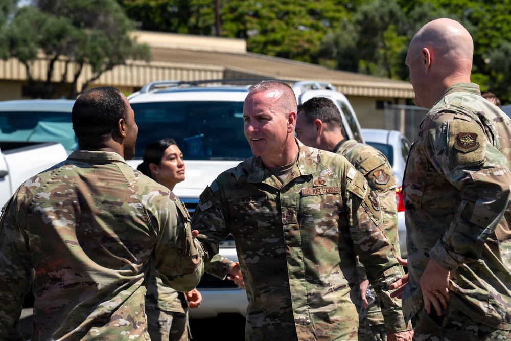 515th AMOW and 735th AMS Airmen Brief CMSAF Wolfe on Global Mobility Operations