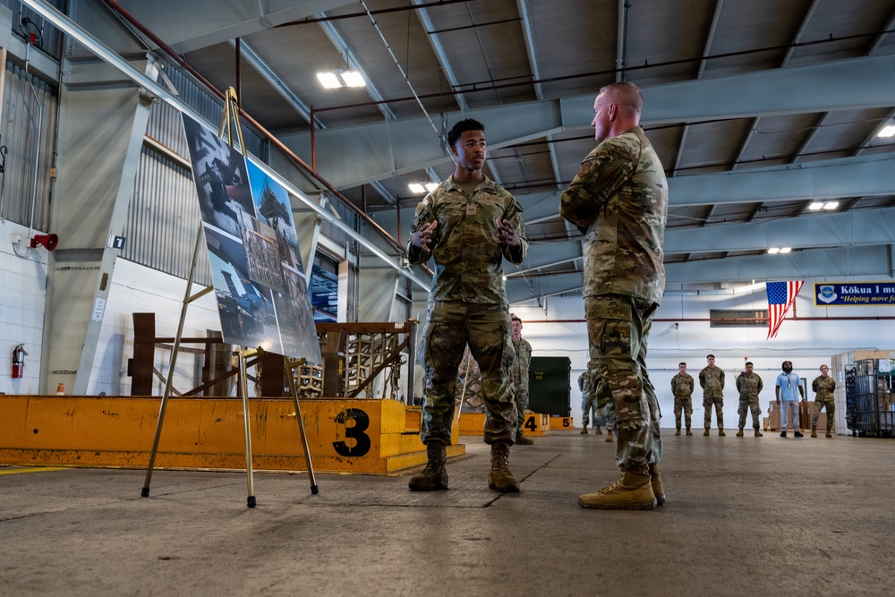 515th AMOW and 735th AMS Airmen Brief CMSAF Wolfe on Global Mobility Operations