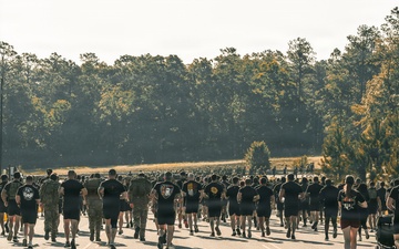 3rd Special Forces Group (Airborne) Soldiers honor Staff Sgt. Robert J. Miller during annual memorial 5K