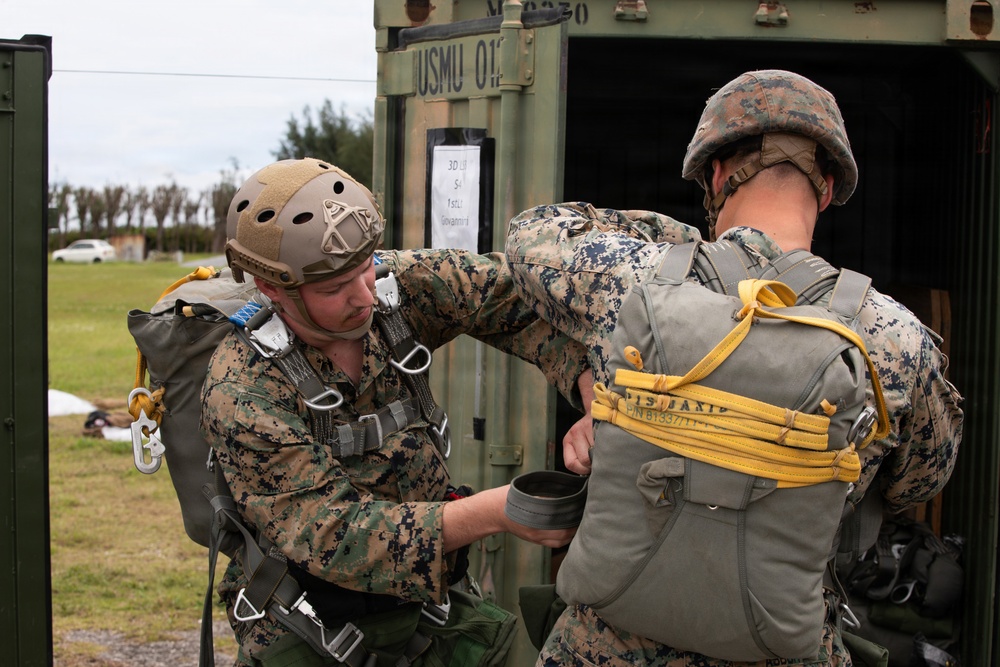3rd Landing Support Battalion Marines Conduct Airborne, Air Delivery, and Night Operation Training on Ie Shima, Okinawa