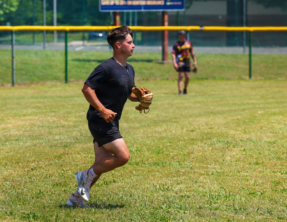 U.S. Army soldiers play softball during Week of the Eagles