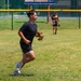 U.S. Army soldiers play softball during Week of the Eagles