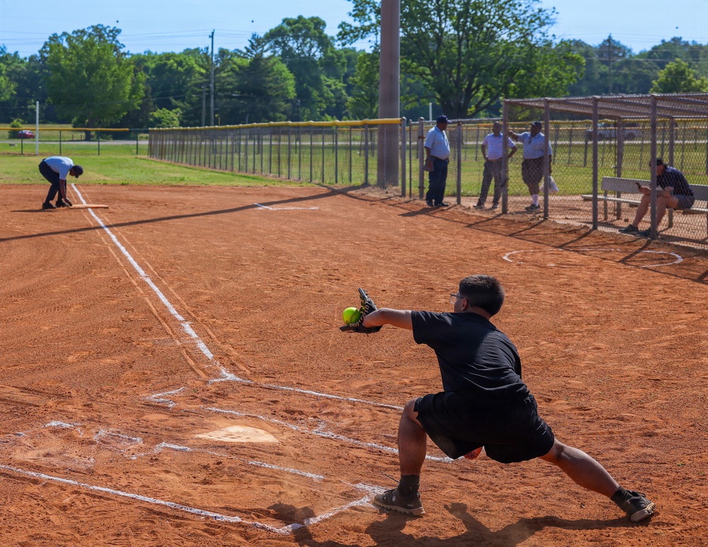 U.S. Army soldiers play softball during Week of the Eagles