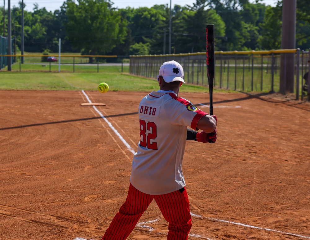 U.S. Army soldiers play softball during Week of the Eagle